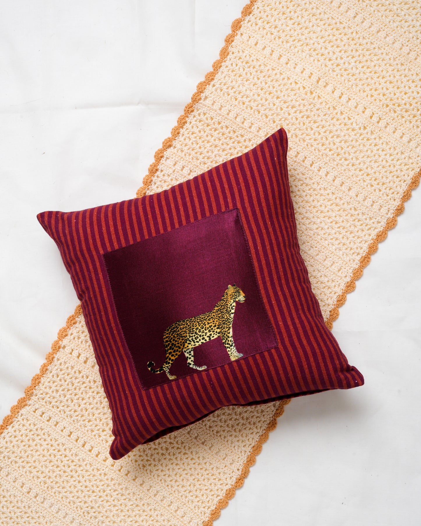 Striped cushion cover with printed patch detail