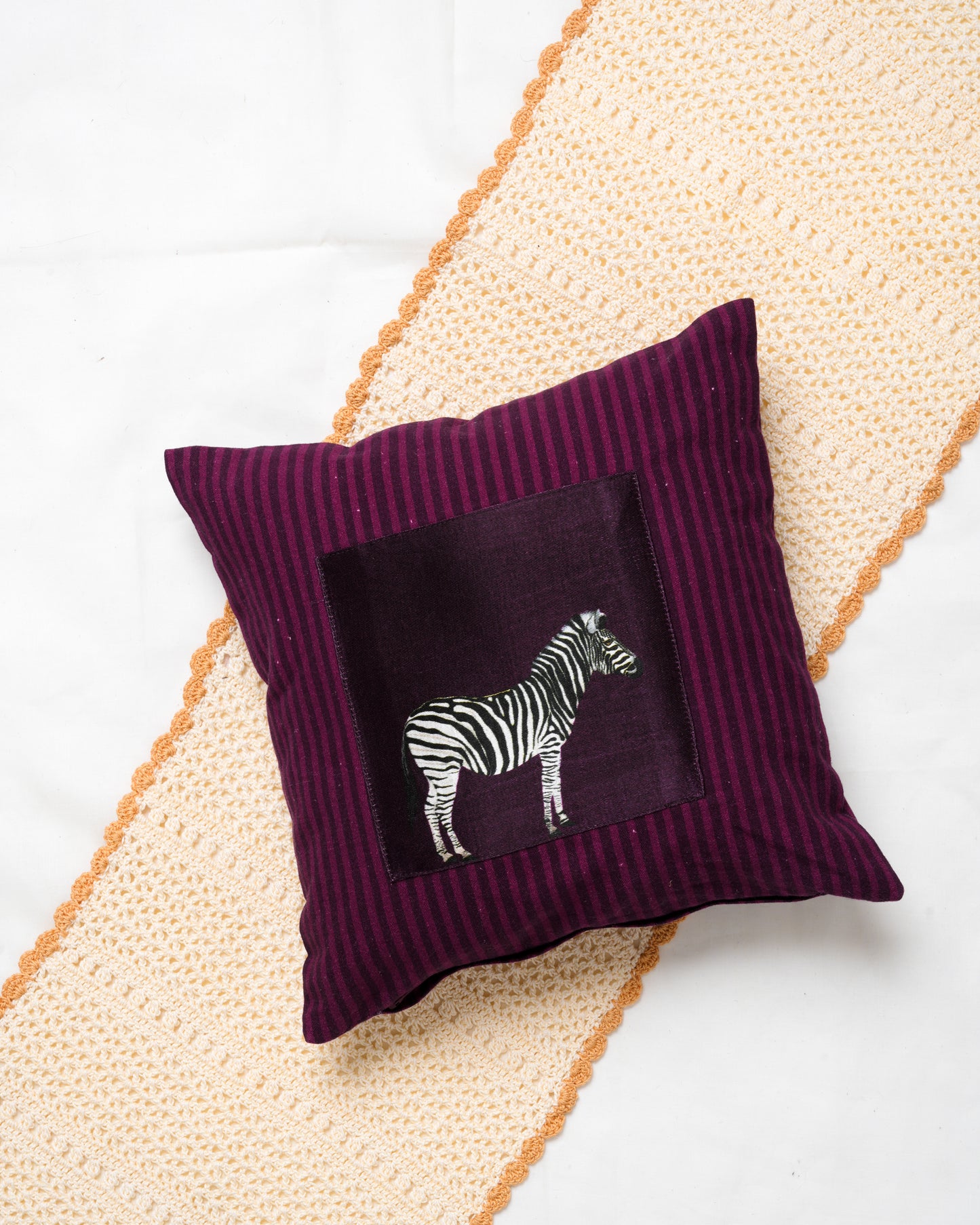 Striped cushion cover with printed patch detail