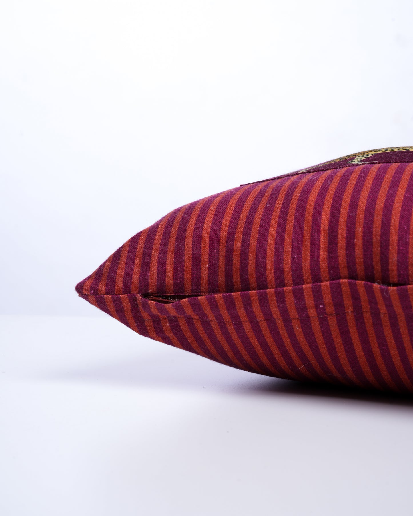 Striped cushion cover with printed patch detail
