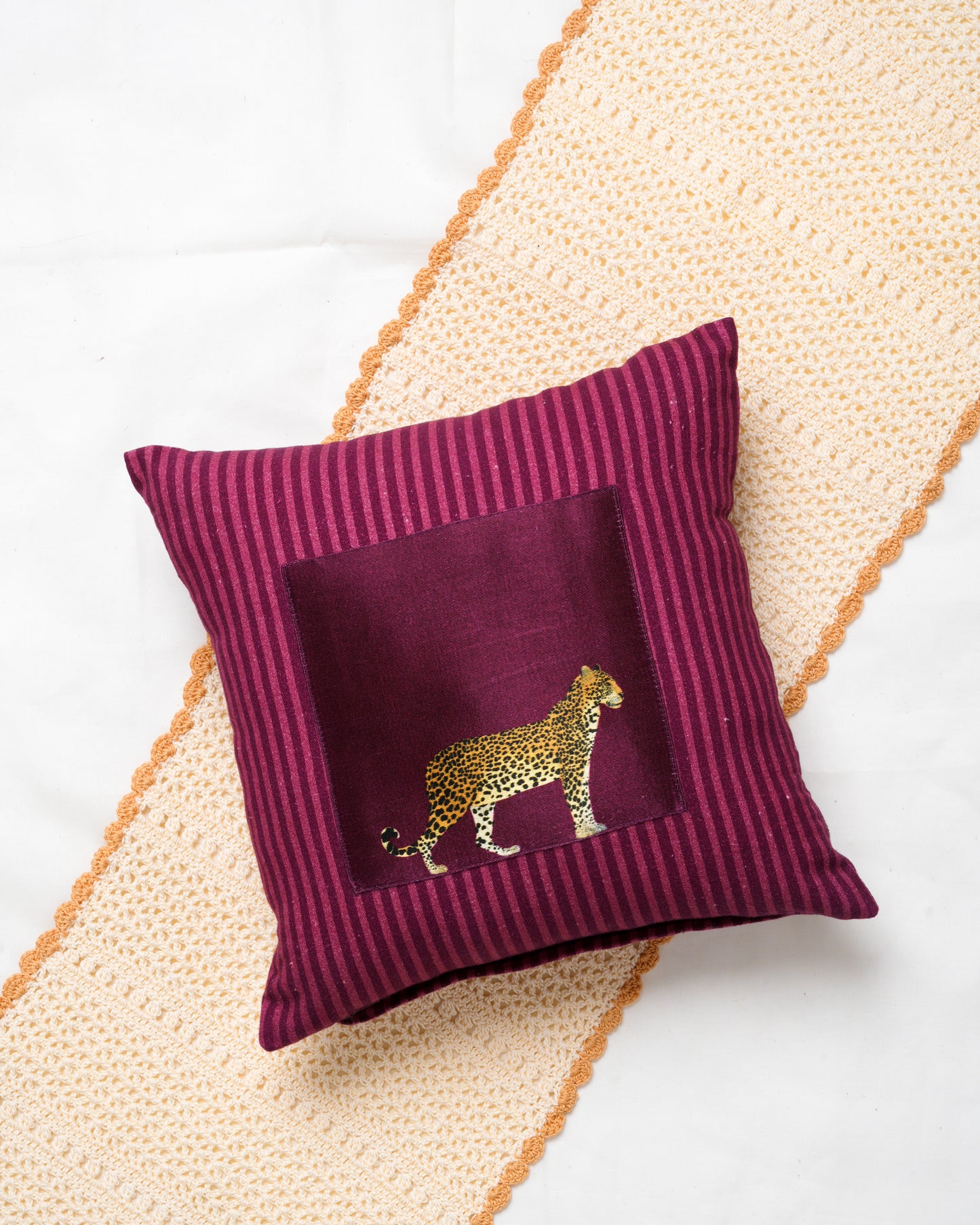 Striped cushion cover with printed patch detail